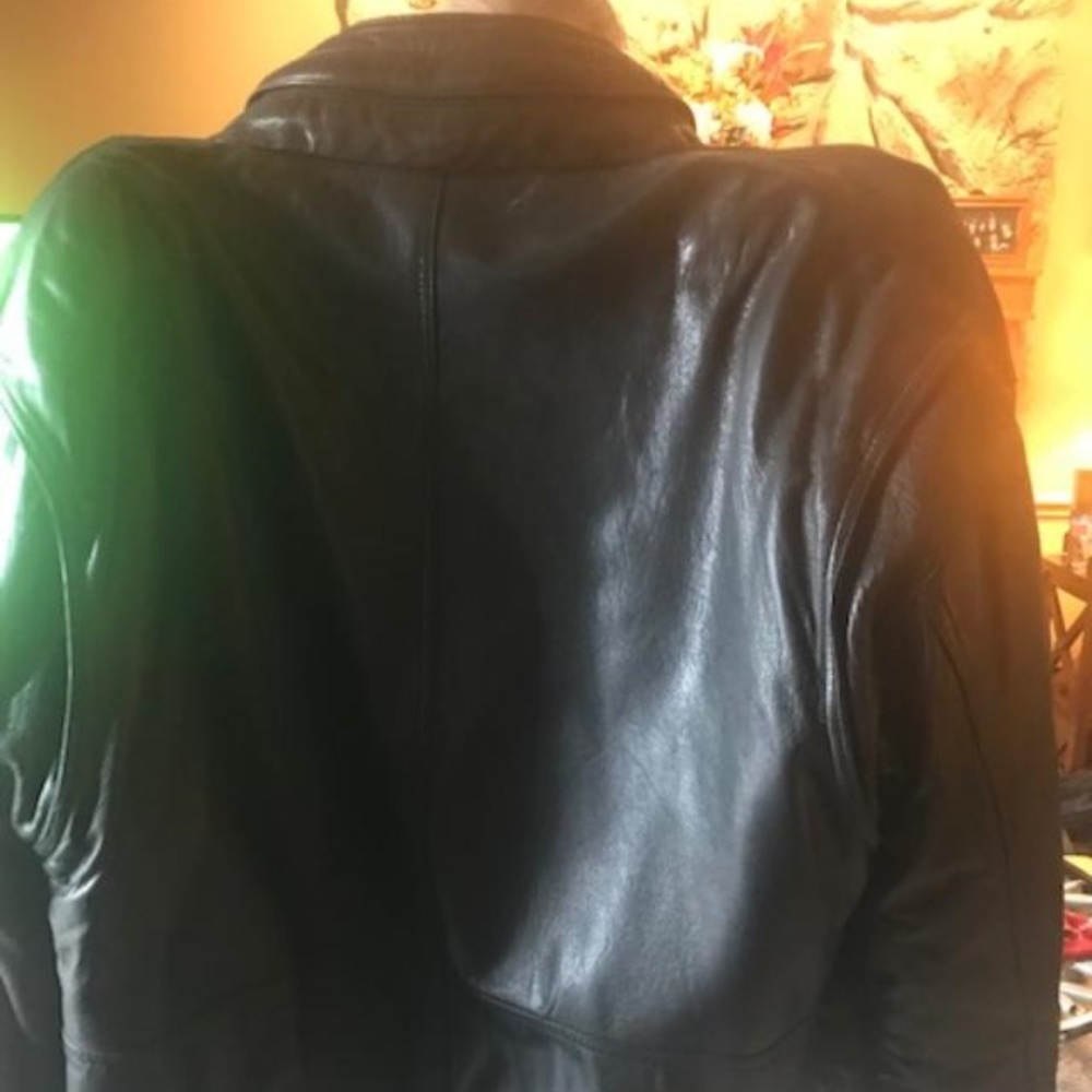Men's used Leather Andrew Marc fur lined jacket.